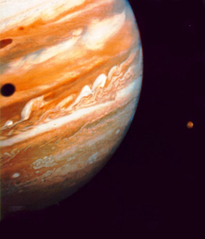 Jupiter and Io, view from Voyager 2
